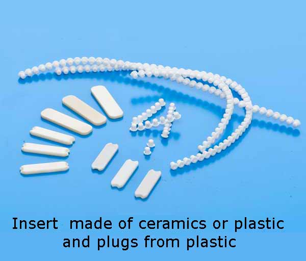 Insert made of ceramics of plastic and plugs from plastic